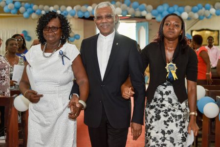 President David Granger yesterday afternoon attended the 180th anniversary service of the All Saints Anglican Church, New Amsterdam, East Berbice- Corentyne.  In this Ministry of the Presidency photo, he is being escorted upon arrival at the Church.
