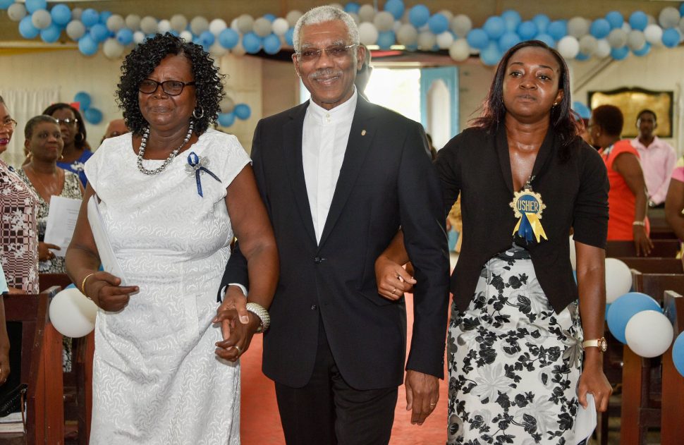 President David Granger yesterday afternoon attended the 180th anniversary service of the All Saints Anglican Church, New Amsterdam, East Berbice- Corentyne.  In this Ministry of the Presidency photo, he is being escorted upon arrival at the Church.
