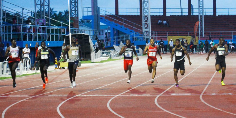 Ghanian, Joseph Amoah (lane 5) was out in a flash and quickly separated himself from the field for a commanding victory over national champion, Emanuel Archibald and Winston George. (Orlando Charles photo)
