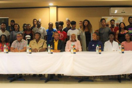 Athletes, sponsors and organizers of the fourth Aliann Pompey Invitational (API) pose for a photo yesterday following the final press briefing at Sleep Inn Hotel.
