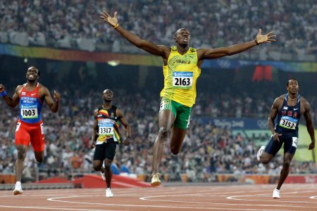 Jamaica's Usain Bolt crosses the finish line to win the gold in the men's 200-meter final during the athletics competitions in the National Stadium at the Beijing 2008 Olympics in Beijing.