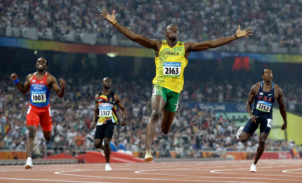 Jamaica’s Usain Bolt crosses the finish line to win the gold in the men’s 200-meter final during the athletics competitions in the National Stadium at the Beijing 2008 Olympics in Beijing.