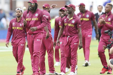 Chris Gayle and the victorious West Indies team

