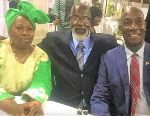 Trinidad Prime Minister Dr Keith Rowley with murdered couple John Mills, and his wife Eulyn