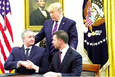 Homeland Security Secretary Kevin McAleenan (right) signed an agreement with Guatemala’s minister of government, Enrique Antonio Degenhart. President Donald trump is standing (Reuters photo)
