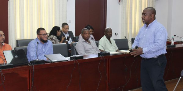 Dr Erwin Edwards of Atom Solutions Inc, Barbados speaking at the event. (Ministry of Business photo)