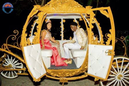 Karina Samaroosingh, a student of Bishop Anstey Girls High School East and her date Nathan Greer, of Trinity College East, arrive in a carriage for their graduation ball at the Trinidad Hilton and Conference Centre on Thursday night.