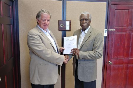 GCAA Director General Egbert Field (right) at the contract signing  