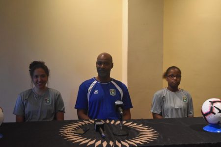 Head coach of the Lady Jags team Dr. Ivan Joseph (Centre) at yesterday’s press conference at the Ramada Hotel. (Photo courtesy of the Guyana Football Federation) 