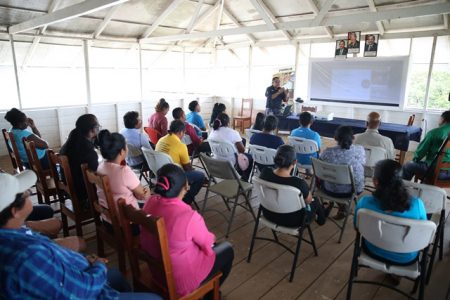 MACORP Training Director Miguel Oviedo speaking to the residents of Annai, Region 9. (DPI photo)