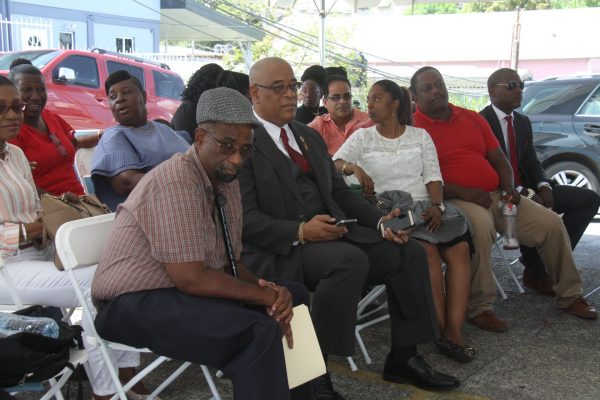 PNM candidates wait outside the South Regional office, in San Fernando yesterday as the PNM continues its screening process for the upcoming Local Government Elections.