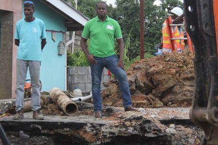 MP for Moruga/Tableland, Dr Lovell Francis (centre) looks on as work begins at Indian Walk, Moruga collapsed road in January.