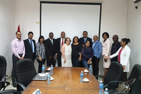The MCG team with Cuban officials and others. (Medical Council of Guyana photo)
