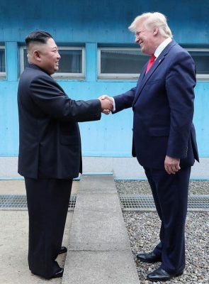 U.S. President Donald Trump shakes hands with North Korean leader Kim Jong Un as they meet at the demilitarized zone separating the two Koreas, in Panmunjom, South Korea, June 30, 2019. KCNA via REUTERS
