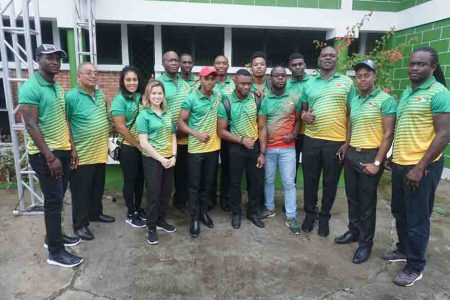Seeking Peruvian gold: The athletes and officials from rugby, squash and boxing left yesterday from the Cliff Anderson Sports Hall. (Emmerson Campbell photo)
