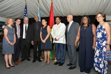 From left are US Ambassador to Guyana Sarah Ann Lynch, her son, Dylan, her husband, Kevin, President David Granger, First Lady Sandra Granger, Prime Minister Moses Nagamootoo, the Deputy Chief of Mission Mark Cullinane, Minister of Foreign Affairs Dr. Karen Cummings and  Cullinane’s wife,  Marcia Bosshardt during a reception last evening in celebration of the 243rd Declaration of Independence anniversary of the United States of America.  The ceremony was held at the US Ambassador’s residence in Cummings Lodge. (Ministry of the Presidency photo) 
