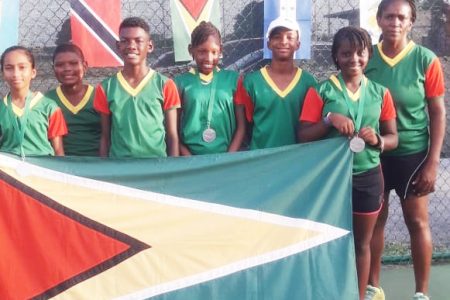 Shelly Daly-Ramdyhan (extreme right) and the Guyana contingent for the ITF/COTECC U12 development tournament. 