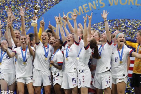 The USA women’s soccer team celebrating their fourth World Cup triumph after a 2-0 defeat of the Netherlands.
