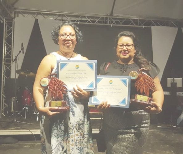 From left are Melanie McTurk, of Karanambu Lodge, and Carla James, Deputy Director of the Guyana Tourism Authority, who are displaying the awards that were conferred on Thursday during the Caribbean Sustainable Tourism Awards in St. Vincent and the Grenadines. (GTA photo)
