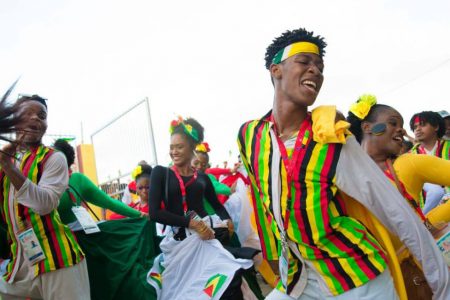 Members of the Guyana delegation during the Parade of Nations for the opening of the fourteenth Caribbean Festival of Arts (CARIFESTA), which began in Trinidad and Tobago yesterday. Guyana’s delegation comprises a hundred members. (Department of Public Information photo)
