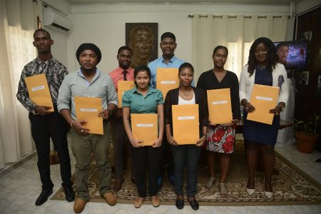 From left are: Keron Braithwaite, Lhee-Rand Castello, Kofi Oradel Gray (at rear), Jennifer Mahabir, Asaph Ahmad (at rear), Keneisha Gopaul, Denisha Leitch and Clavis Fraser-Tappin. (Department of Public Information photo)
Picture can be found in Y: Pictures: Cuba Scholarship Awardees
