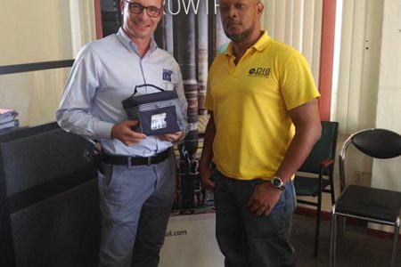 Tullow Oil country representative Joachim Vogt (left) and EPIC Guyana Executive Director Brian Backer