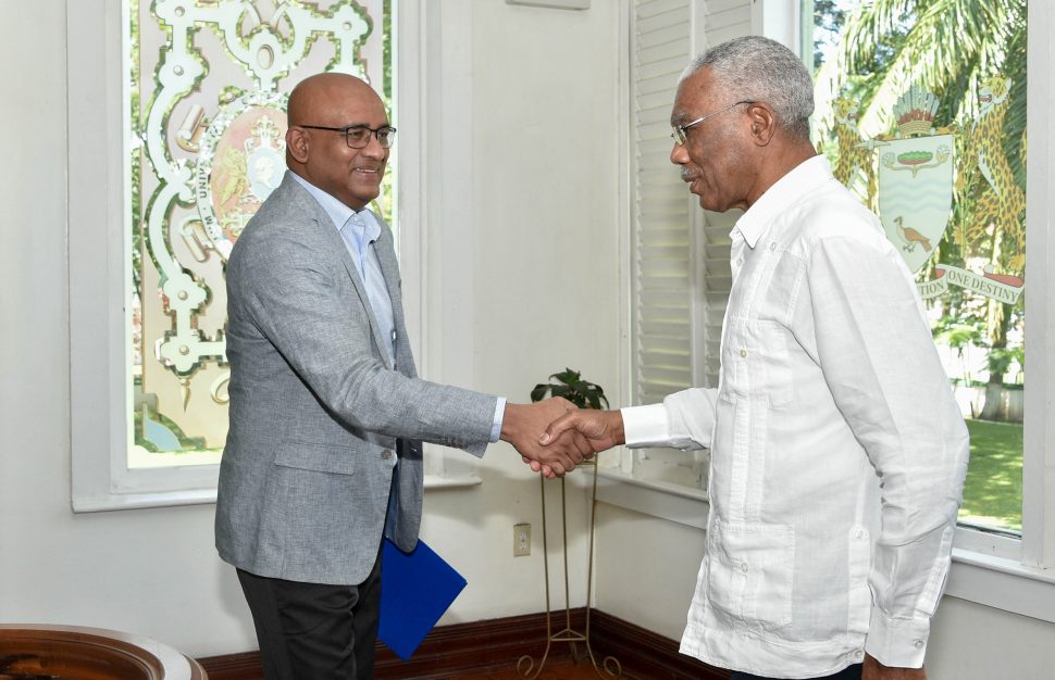 President David Granger greeting Opposition Leader Bharrat Jagdeo upon his arrival at State House yesterday afternoon. (Ministry of the Presidency photo)
