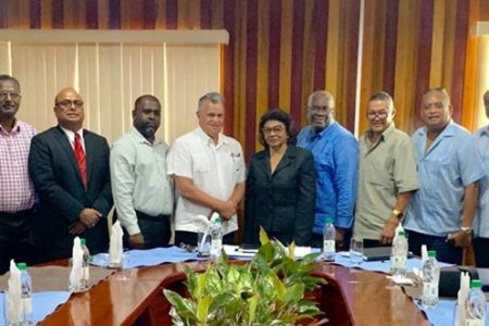 A delegation from the Private Sector Commission (PSC) led by Chair Gerry Gouveia (6th from left) met with Chair of the Guyana Elections Commission (GECOM) retired Justice Claudette Singh (7th from left) and Chief Election Officer Keith Lowenfield (8th from left).