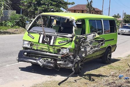 Aftermath: Several persons were injured after these now damaged Route 32 (Georgetown-Parika) minibuses collided head-on at Philadelphia, East Bank Essequibo, yesterday afternoon. The accident occurred around 2 pm. The injured were subsequently rushed to the West Demerara Regional Hospital for treatment. (Photo taken from West Demerara Road Safety Council Facebook page)