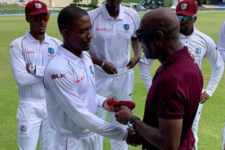 Batsman Shamarh Brooks received his Test cap from legendary West Indies captain and batsman Sir Vivian Richards yesterday. (CWI photo)