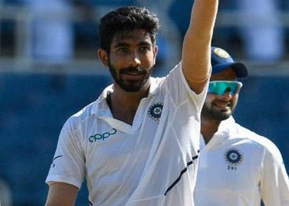 Fast bowler Jasprit Bumrah acknowledges the Indian dressing room after clinching a historic hat-trick against West Indies on yesterday’s day two of the second Test at Sabina Park.
