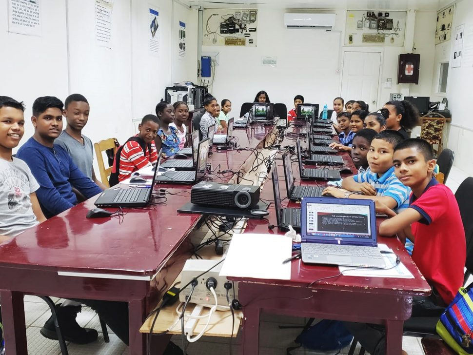 ICT fundamentals: A total of 215 young students in Demerara, Berbice and Essequibo will graduate this week after completing twenty-five weeks of learning the fundamentals of Computer Coding, Programming, Problem Solving and Data Management, a release from the Ministry of Public Telecommunications said yesterday.  The Coding Camps served as the students’ introduction to the field of  information and communication technology. This Ministry of Public Telecommunications photo shows students at the Essequibo Technical Institute.

