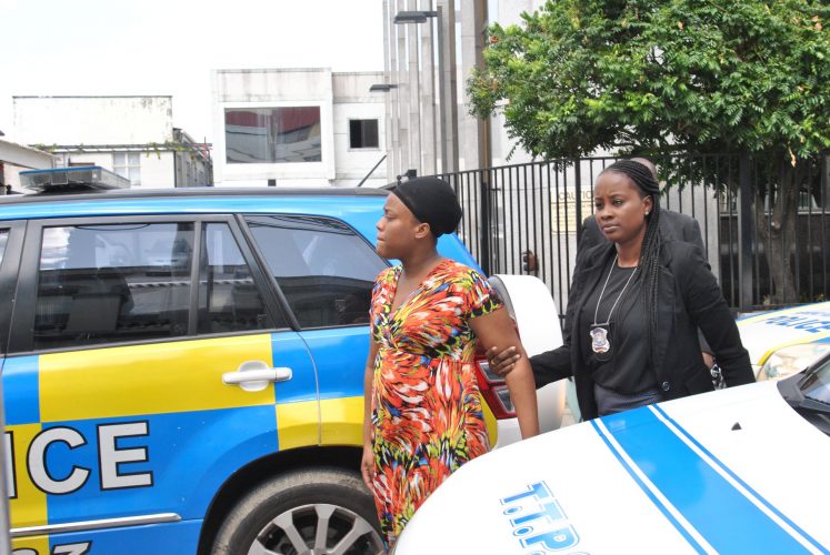 Rhonda McMeo arrives at the Port-of-Spain Magistrates’ Court yesterday, where she appeared on gang affiliation charges.  TRINIDAD GUARDIAN/Anisto Alves 