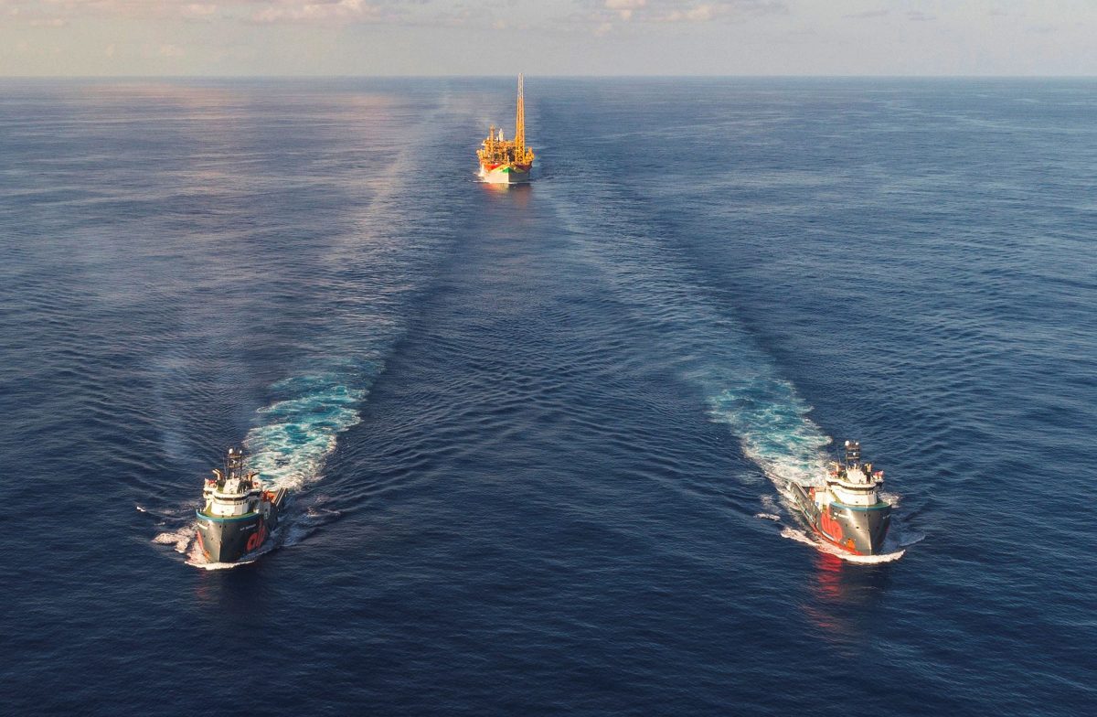 The Liza Destiny being escorted to its position (ExxonMobil photo)
