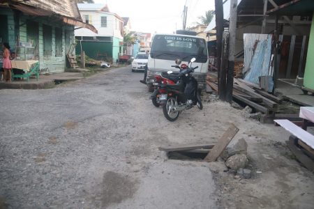  As of 5.30 pm yesterday, the City Engineer’s Department was still to cover an exposed manhole at James and La Penitence streets, Albouystown, despite an undertaking by acting Chief City Engineer Kenson Boston. At Monday’s statutory meeting of the City Council, Boston had promised to place a cover over the manhole by 4 pm yesterday. When Stabroek News visited the area after the set time, the residents quickly pointed out the manhole to be photographed and said that they have been waiting months for it to be covered. Several boards were seen inside the manhole, which is located at the corner of the two streets. Councillor Heston Bostwick has been calling on the Engineer’s Department to fix the exposed manhole due to the danger it poses to citizens. He told the council, “Three children have already fallen into the manhole on James Street. There are elderly people using the street also and having that manhole open is not good.” (Terrence Thompson photo)