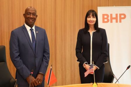 Prime Minister Dr Keith Rowley and BHP President Operations Petroleum Geraldine Slattery pose for a photo at the energy company’s petroleum headquarters in Houston, Texas in June. The PM visited the company to hold talks on various energy-related matters.