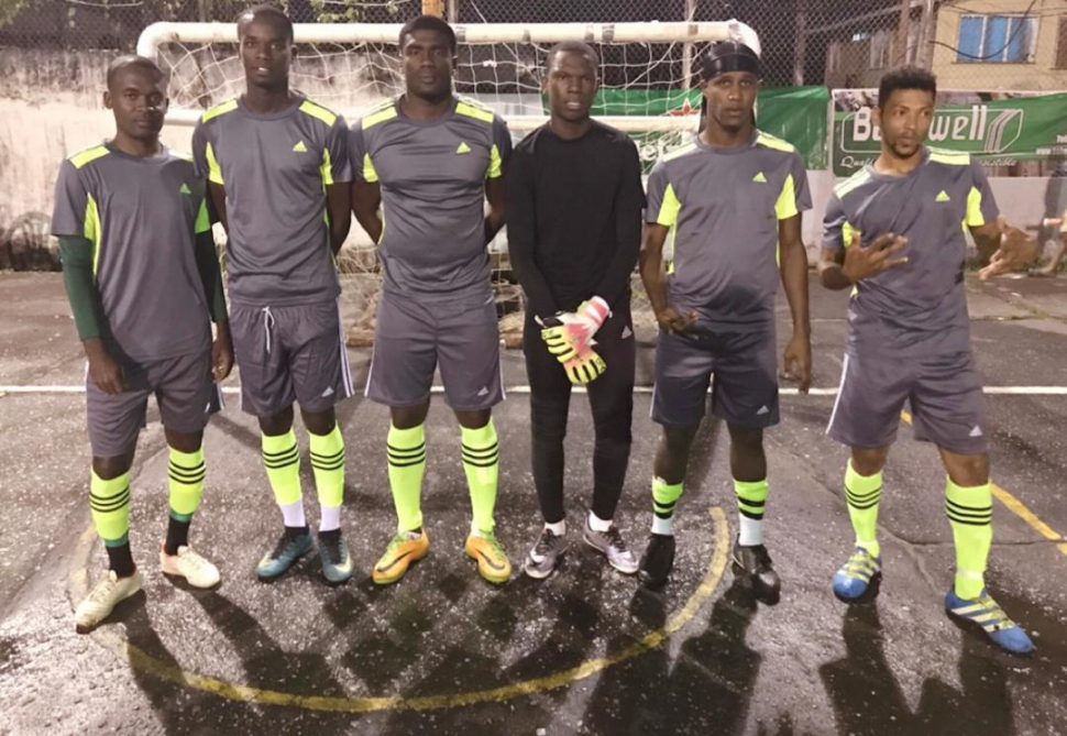 The NK Ballers unit- from row from left to right-Rawle Gittens, Jermaine Grandison, Keon Sears, Kacy John and Kenard Simon. Back row from left to right-Travis Bess, Jamal Haynes, Donovan Francis, Joel Isaacs and Darius Frank.