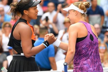  Defending US Open women’s champion Naomi Osaka shakes hands with Anna Blinkova of Russia after their first round match. (Reuters photo)