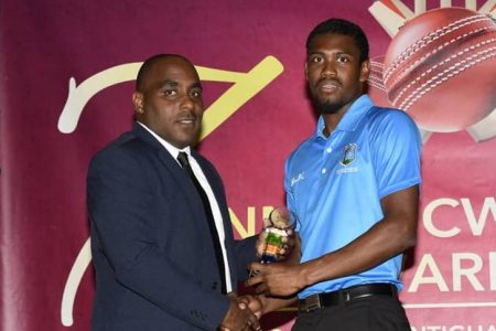 Keemo Paul receives his award for being adjudged the T20 International Player of the Year.
