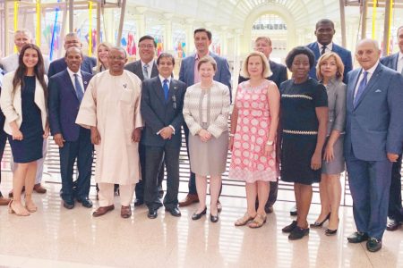 Ambassador Riyad Insanally (fifth from left in front row) with attendees following his presentation at the Ronald Reagan Building and International Trade Center.  (Ministry of Foreign Affairs photo)
