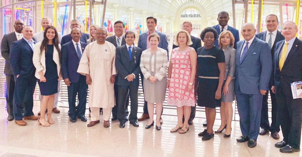 Ambassador Riyad Insanally (fifth from left in front row) with attendees following his presentation at the Ronald Reagan Building and International Trade Center.  (Ministry of Foreign Affairs photo)