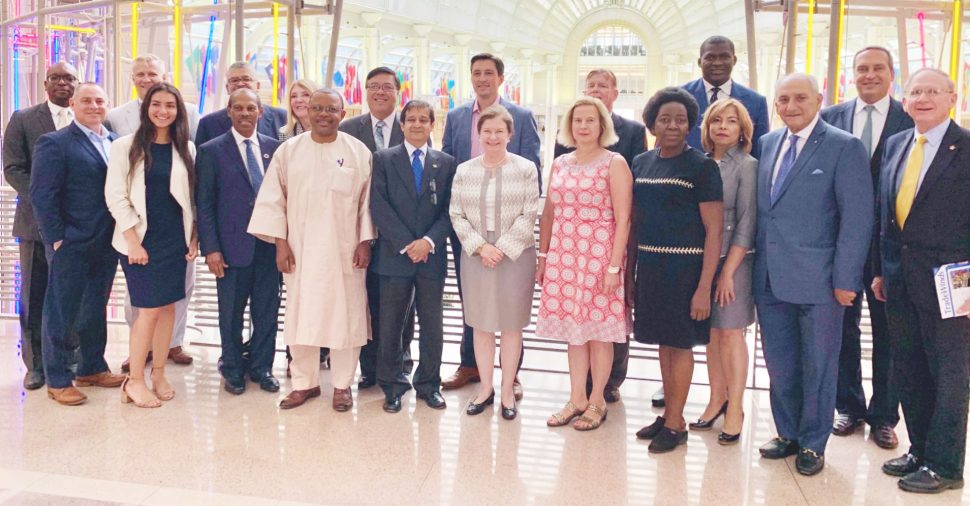 Ambassador Riyad Insanally (fifth from left in front row) with attendees following his presentation at the Ronald Reagan Building and International Trade Center.  (Ministry of Foreign Affairs photo)

