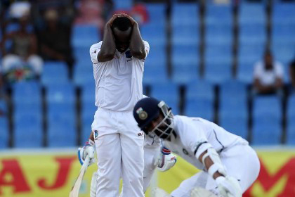 Fast bowler Kemar Roach reacts in frustrating during yesterday’s third day of the opening Test against India.