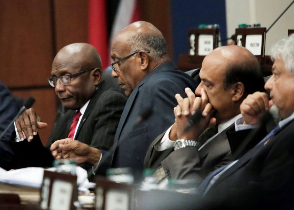 Opposition MPs, from left, Rodney Charles, Suruj Rambachan, Fazal Karim and Bhoe Tewarie during the debate in Parliament, on Wednesday.