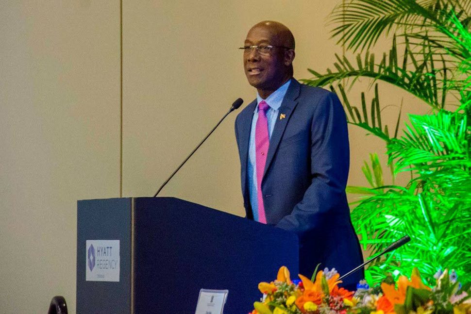 Prime Minister Dr Keith Rowley delivers the feature address at the launch of the Three-Tier Mentorship Programme for Energy Professionals at the Hyatt Regency, Port of Spain, yesterday.
