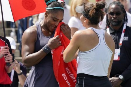 Canada; Serena Williams (left) dries her eyes with a towel after withdrawing in the championship match against Bianca Andreescu (right) during the Rogers Cup tennis tournament at Aviva Centre. Mandatory Credit: John E. Sokolowski-USA TODAY Sports