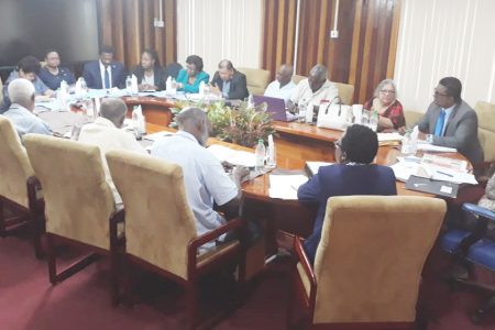A delegation from the governing APNU+AFC coalition yesterday met with the seven GECOM commissioners. Government was represented by parliamentarians Jaipaul Sharma, David Patterson, Amna Ally, Volda Lawrence, Basil Williams, Tabitha Sarabo-Halley, Cathy Hughes, Sydney Allicock and Keith Scott. (GECOM photo)
