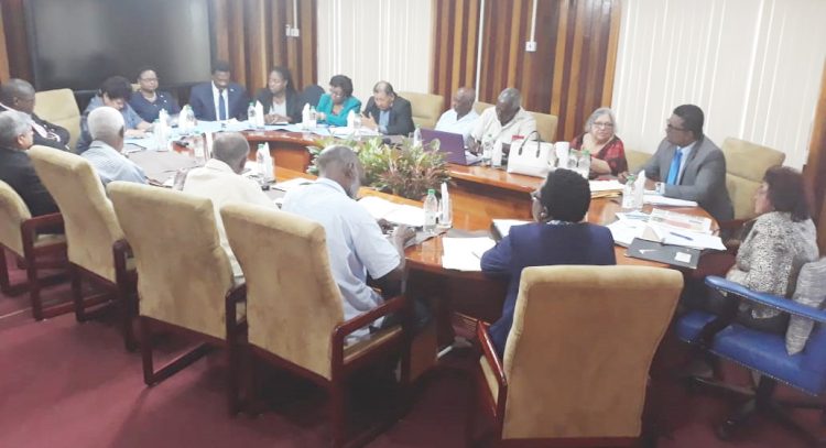 A delegation from the governing APNU+AFC coalition yesterday met with the seven GECOM commissioners. Government was represented by parliamentarians Jaipaul Sharma, David Patterson, Amna Ally, Volda Lawrence, Basil Williams, Tabitha Sarabo-Halley, Cathy Hughes, Sydney Allicock and Keith Scott. (GECOM photo)
