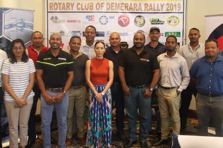 President of the Rotary Club of Demerara Hansraj Singh (front row-third from left) with club members and various sponsor representatives following yesterday’s launch at the Pegasus Hotel.