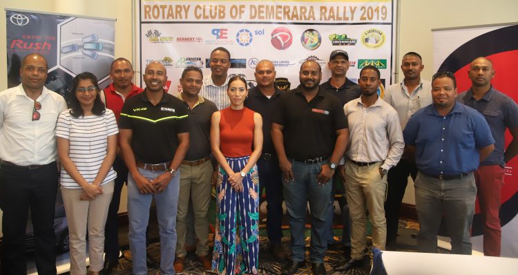 President of the Rotary Club of Demerara Hansraj Singh (front row-third from left) with club members and various sponsor representatives following yesterday’s launch at the Pegasus Hotel.